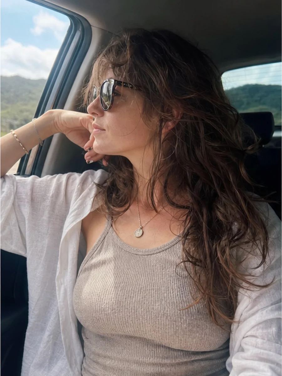 Car back seat pose 1 with a fictional adult model