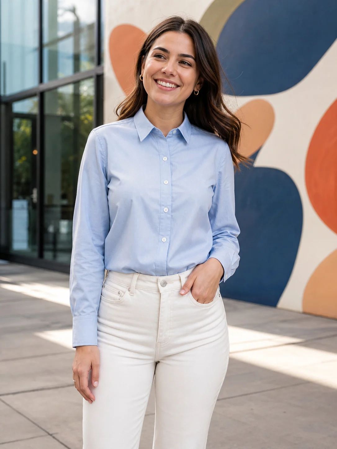 Blue shirt and white jeans worn by a fictional adult model